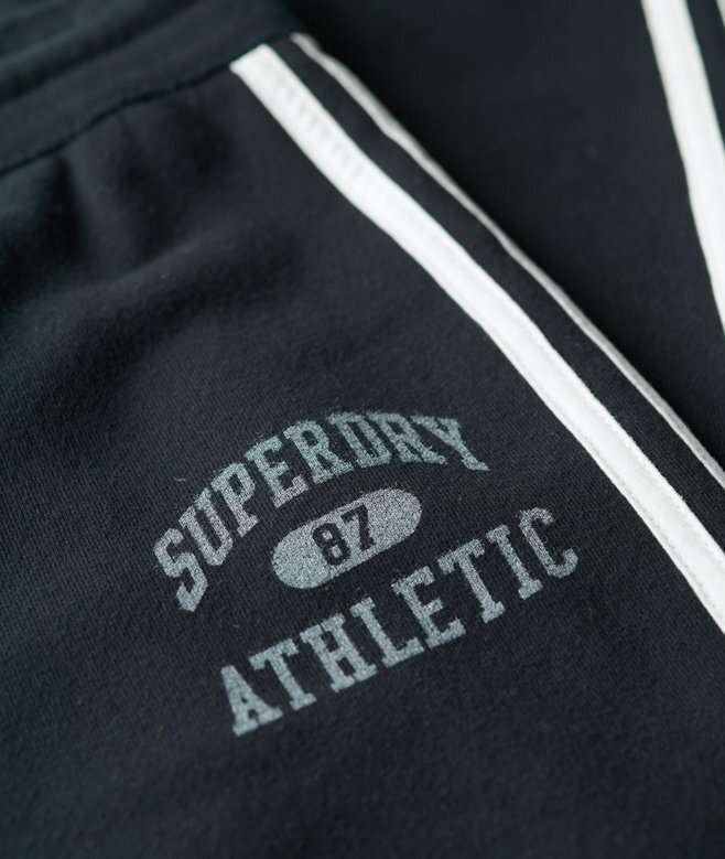 Spodnie dresowe Athletic Essentials Stripe Flare Spodnie dresowe Athletic Essentials Stripe Flare