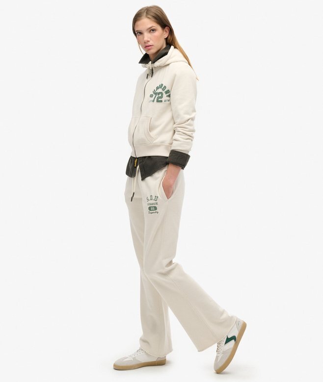 Spodnie dresowe Athletic Essentials z niskim stanem i rozszerzanymi nogawkami Spodnie dresowe Athletic Essentials z niskim stanem i rozszerzanymi nogawkami