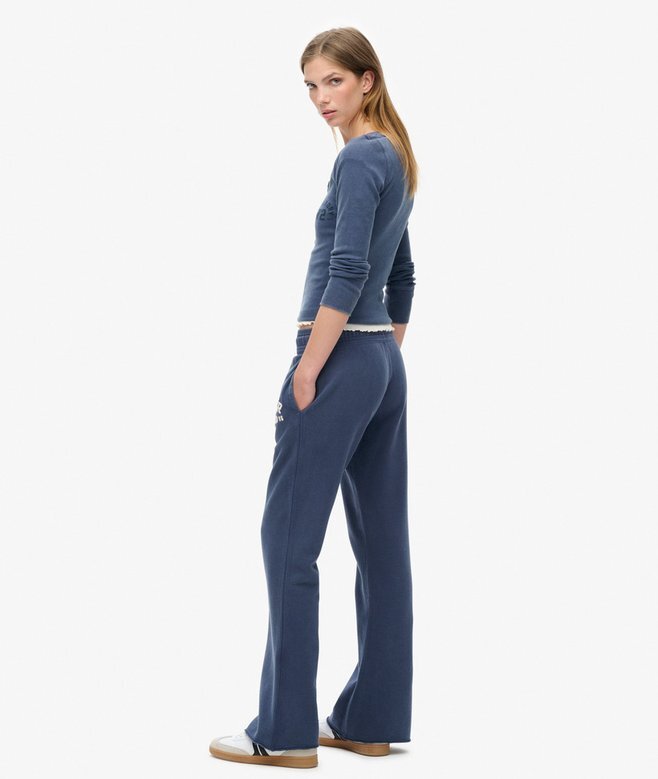 Spodnie dresowe Athletic Essentials z niskim stanem i rozszerzanymi nogawkami Spodnie dresowe Athletic Essentials z niskim stanem i rozszerzanymi nogawkami
