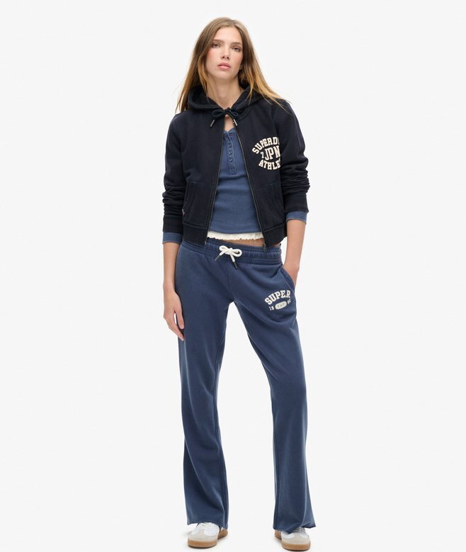 Spodnie dresowe Athletic Essentials z niskim stanem i rozszerzanymi nogawkami Spodnie dresowe Athletic Essentials z niskim stanem i rozszerzanymi nogawkami