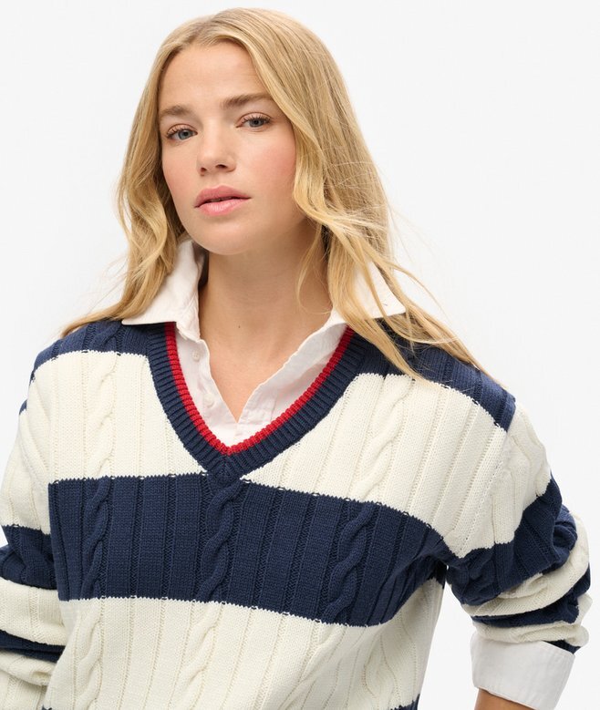 Sweter oversize w paski z dekoltem w serek Sweter oversize w paski z dekoltem w serek