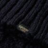 Sweter z wysokim kołnierzem i splotem warkoczowym